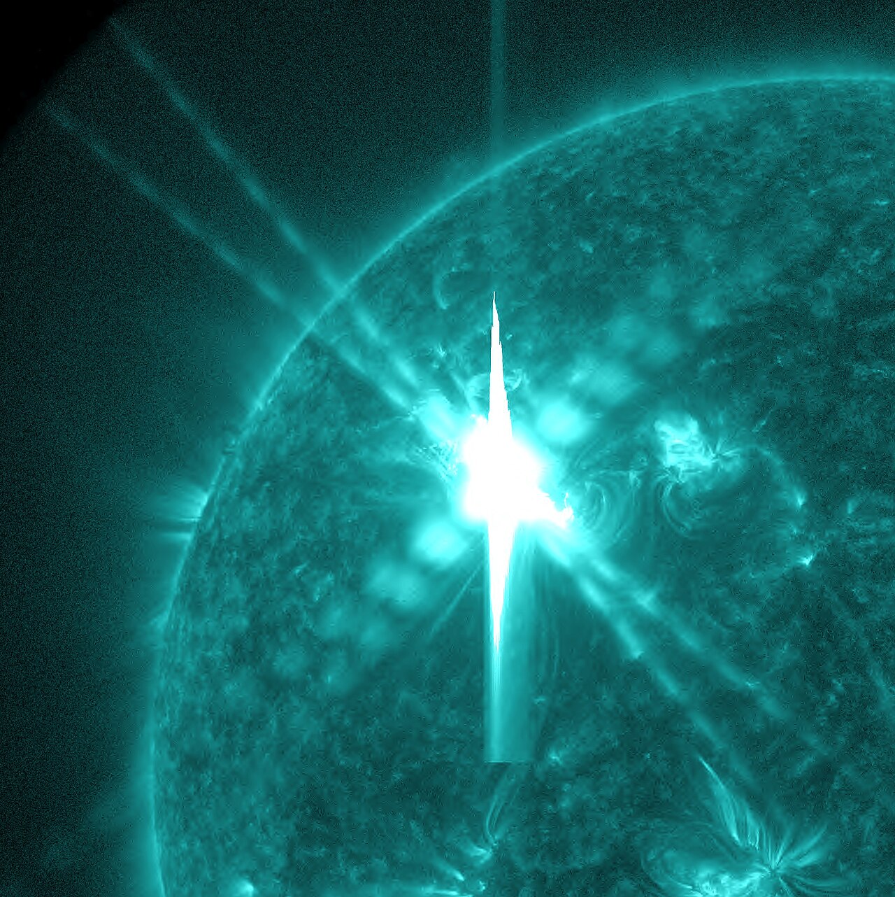 Image artefacts (diffraction spikes and vertical streaks) appearing in a CCD image of a major solar flare due to the excess incident radiation (Credit : NASA Goddard Space Flight Centre)