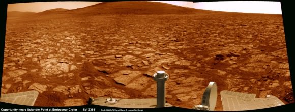 Opportunity rover’s 1st mountain climbing goal is dead ahead in this up close view of Solander Point along the eroded rim of Endeavour Crater. Opportunity will soon ascend the mountain in search of minerals signatures indicative of a past Martian habitable environment. This navcam panoramic mosaic was assembled from raw images taken on Sol 3385 (Aug 2, 2013). Credit: NASA/JPL/Cornell/Marco Di Lorenzo/Ken Kremer (kenkremer.com)
