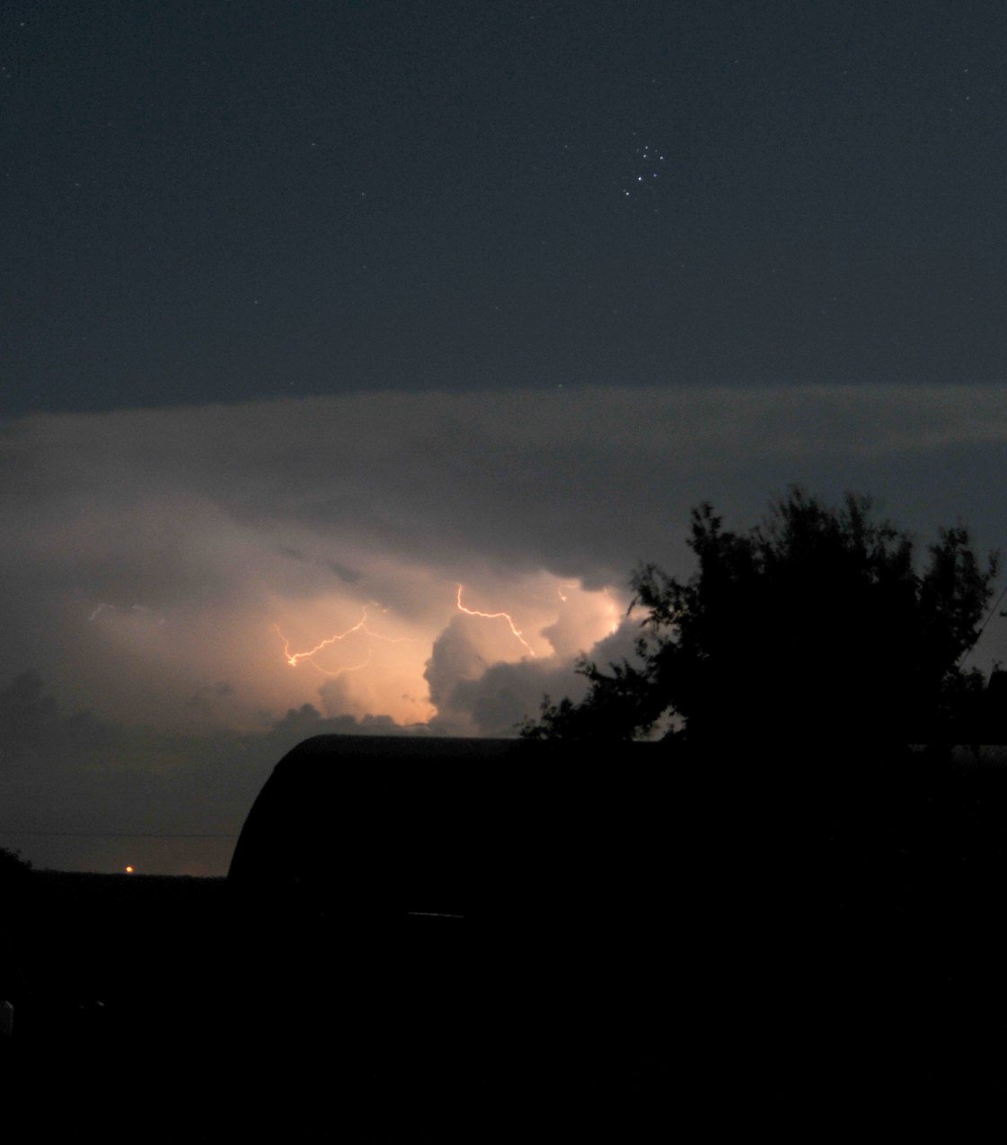 Astrophoto: Pleiades over Lightning by Jerry Littke