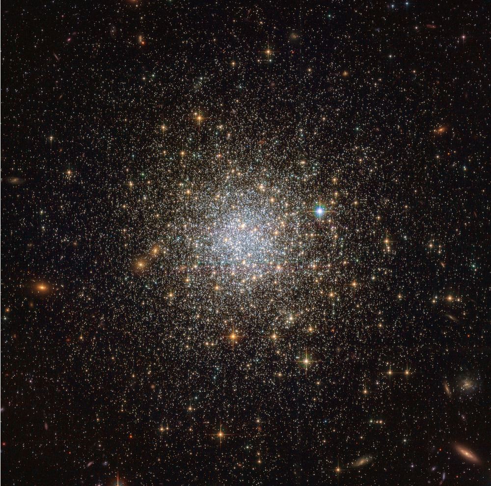 This is another star-filled image of a globular cluster from the Hubble Space Telescope. This is NGC 1466, a GC on the outskirts of the Large Magellanic Cloud. Image Credit: ESA and NASA