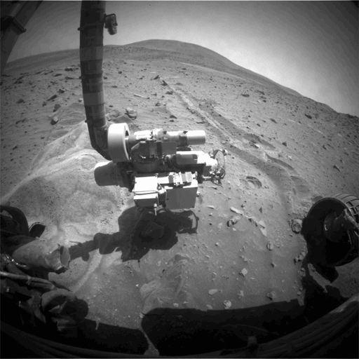This is from Spirit's forward hazcam, from sols 2078 and 2079. You can see the buried wheel in the bottom left portion of the image. Credit: NASA / JPL / animation by Damien Bouic