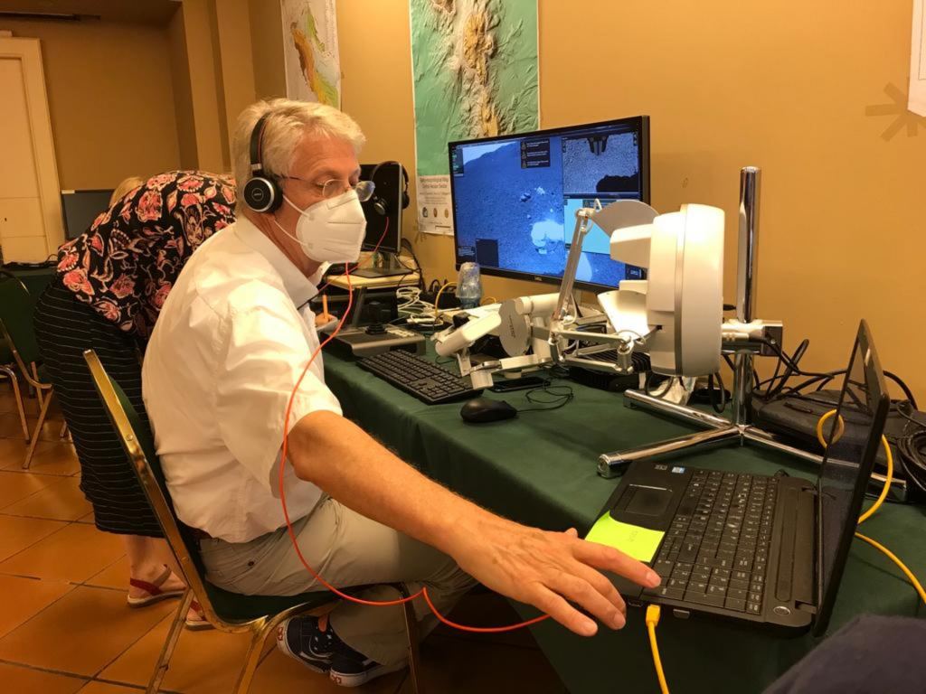 Astronaut Thomas Reiter controlling the Interact Rover, which is 23 km away from his hotel.