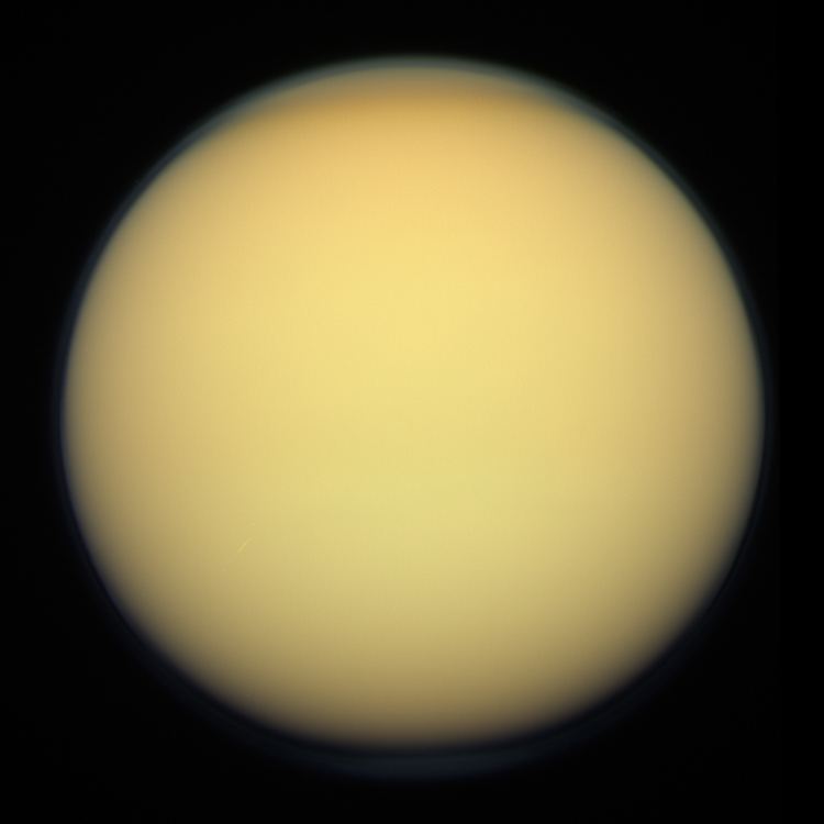 Titan, imaged by the Cassini orbiter, December 2011. A thick shroud of organic haze permanently obscures Titan's surface from viewing in visible light (Credit : NASA/JPL-Caltech/SSI/Kevin M. Gill)