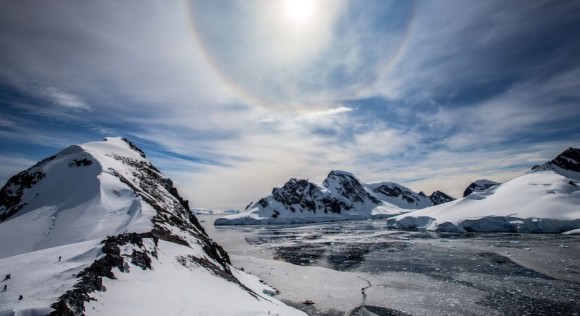A Sun halo seen among the the landscape and ice flows of Antarctica. Credit and copyright: Alex Cornell.