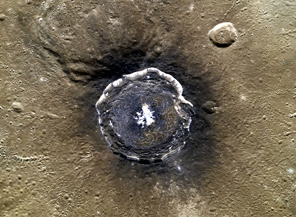 Dark Stains on Mercury Reveal Its Ancient Crust