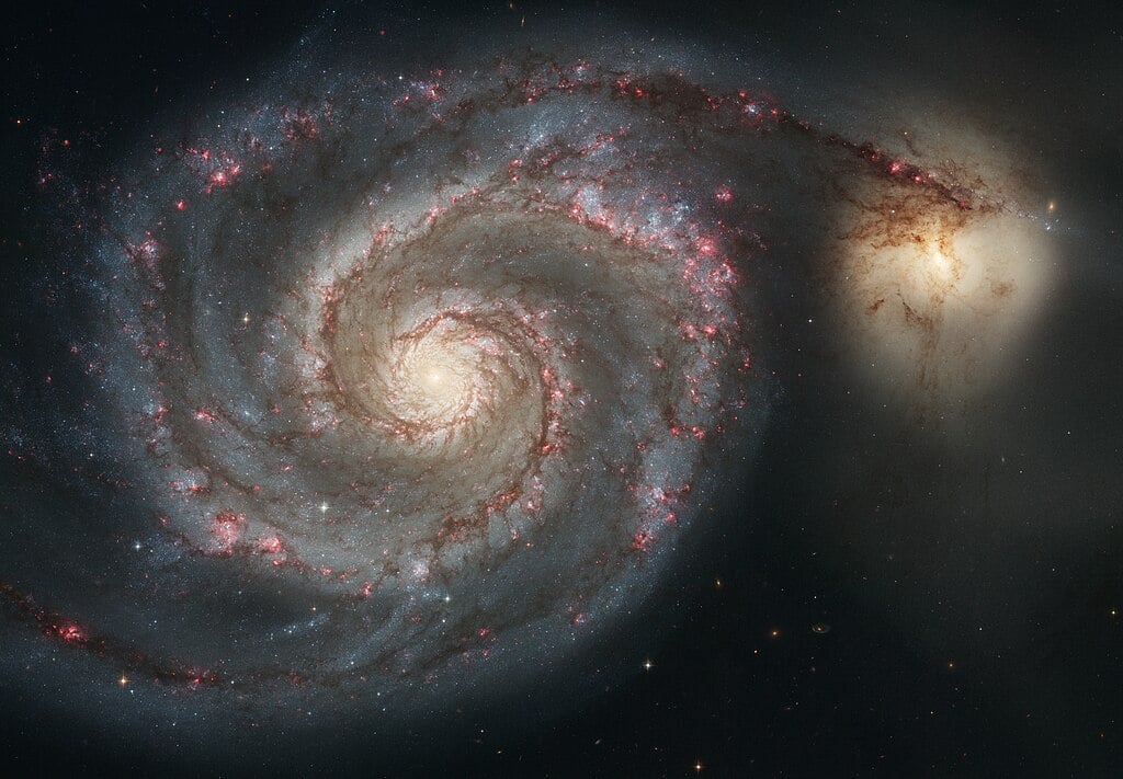An Interesting Solution to the Hubble Tension: The Universe is Slowly Spinning
