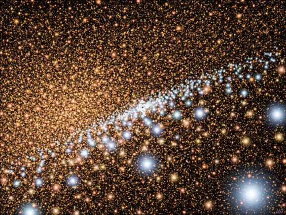 Artist's concept shows young, blue stars encircling a supermassive black hole at the core of a spiral galaxy like the Milky Way.Credit: NASA, ESA, and A. Schaller (for STScI)